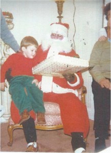 My son Rob gets a present from Santa in 1983