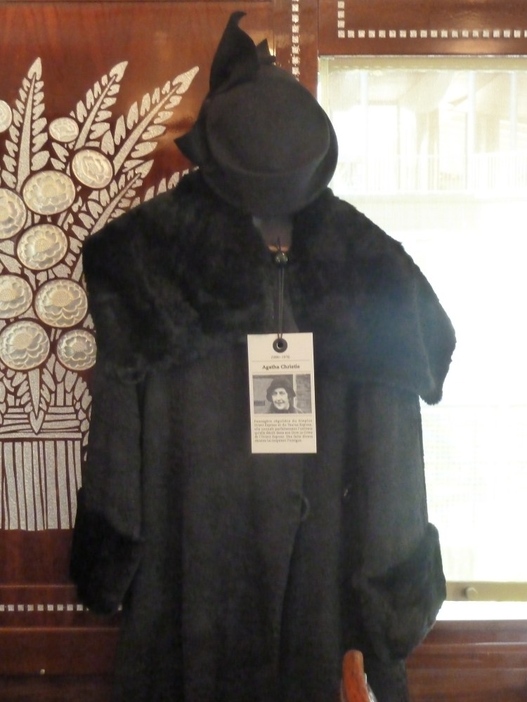 Ms. Christie's hat and coat