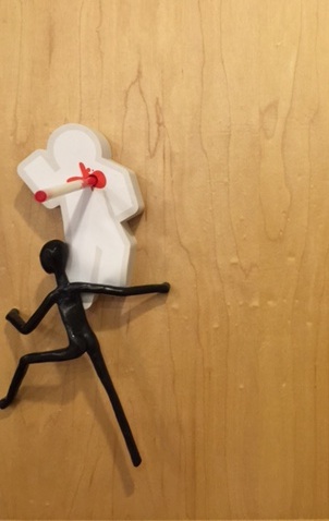 Barb: One of the figures who serve as handles for our kitchen cabinets attempts a climbing rescue of a grievously wounded Dead Fred.