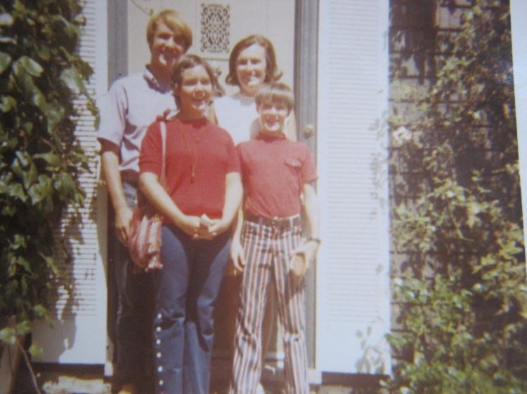 The unfortunate hairdo with l-to-r,  my cousin Paul, my aunt Jo, and my cousin Andy.