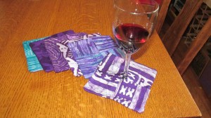 Wine glass coasters made from West African cloth
