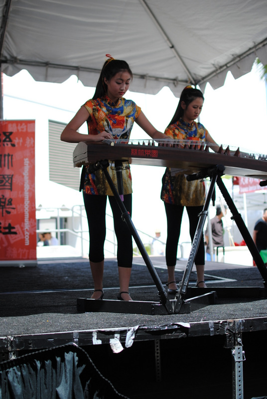 Jen playing a Chinese zither